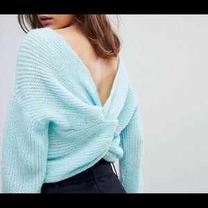 Sweater with twist in the back